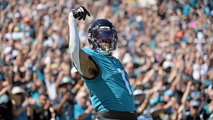 Oct 15, 2023; Jacksonville, Florida, USA; Jacksonville Jaguars running back Travis Etienne (1) celebrates after a touchdown run against the Indianapolis Colts in the first half at EverBank Stadium. Mandatory Credit: Melina Myers-USA TODAY Sports Oct 15, 2023; Jacksonville, Florida, USA; Jacksonville Jaguars running back Travis Etienne (1) celebrates after a touchdown run against the Indianapolis Colts in the first half at EverBank Stadium. Mandatory Credit: Melina Myers-USA TODAY Sports