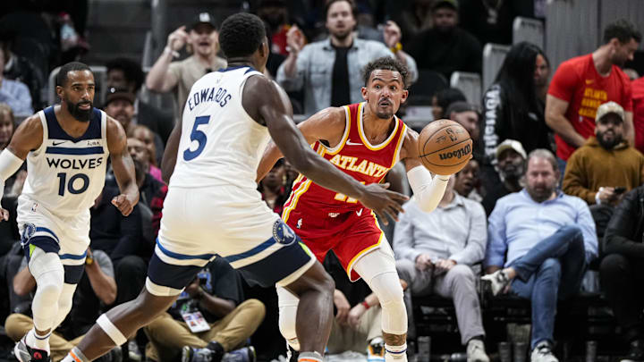 Oct 30, 2023; Atlanta, Georgia, USA; Atlanta Hawks guard Trae Young (11) moves the ball past Oct 30, 2023; Atlanta, Georgia, USA; Atlanta Hawks guard Trae Young (11) moves the ball past