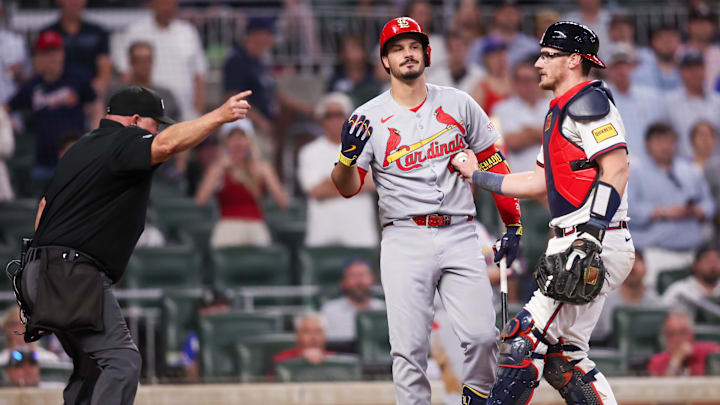 Apr 21, 2025; Atlanta, Georgia, USA; St. Louis Cardinals third baseman Nolan Arenado (28) grounds out softly to Atlanta Braves catcher Sean Murphy (12) in the ninth inning at Truist Park. Mandatory Credit: Brett Davis-Imagn Images
