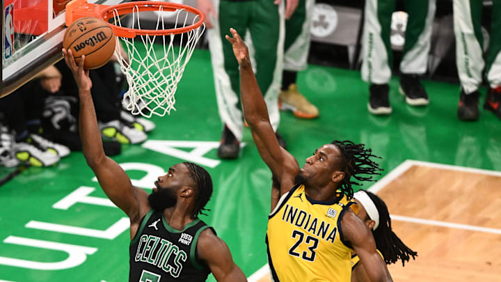 May 23, 2024; Boston, Massachusetts, USA; IBoston Celtics guard Jaylen Brown (7) shoots the ball against Indiana Pacers wing Aaron Nesmith.