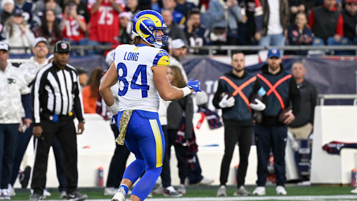 Nov 17, 2024; Foxborough, Massachusetts, USA; Los Angeles Rams tight end Hunter Long (84) lines up against the New England Patriots during the second half at Gillette Stadium. Mandatory Credit: Eric Canha-Imagn Images