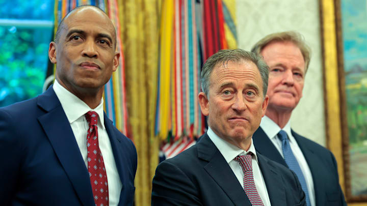 Josh Harris, Roger Goodell, and Scott Turner