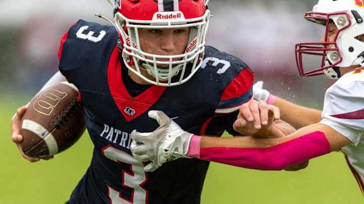 Heritage Hills' Jett Goldsberry (3) pushes off Gibson Southern's Connor Wirey (4) as the Heritage Hills Patriots play the Gibson Southern Titans Saturday, Sept. 28, 2024.