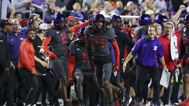 Nov 9, 2024; Fort Worth, Texas, USA; TCU Horned Frogs safety Bud Clark (21) reacts after making an interception during the first half against the Oklahoma State Cowboys at Amon G. Carter Stadium. Mandatory Credit: Kevin Jairaj-Imagn Images Nov 9, 2024; Fort Worth, Texas, USA; TCU Horned Frogs safety Bud Clark (21) reacts after making an interception during the first half against the Oklahoma State Cowboys at Amon G. Carter Stadium. Mandatory Credit: Kevin Jairaj-Imagn Images