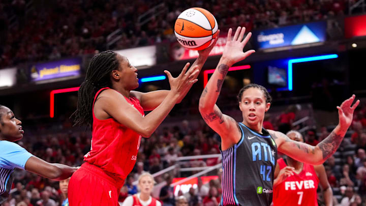 Indiana Fever guard Kelsey Mitchell (0) goes up for a basket against Atlanta Dream center Brittney Griner (42) on Friday, July 11, 2025, during a game between the Indiana Fever and the Atlanta Dream at Gainbridge Fieldhouse in Indianapolis. Indiana Fever guard Kelsey Mitchell (0) goes up for a basket against Atlanta Dream center Brittney Griner (42) on Friday, July 11, 2025, during a game between the Indiana Fever and the Atlanta Dream at Gainbridge Fieldhouse in Indianapolis.