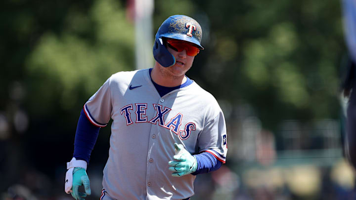 Texas Rangers designated hitter Joc Pederson runs the bases.