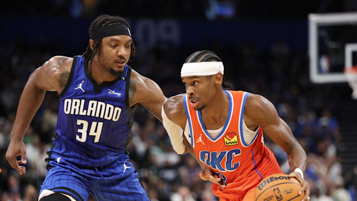 Oklahoma City Thunder guard Shai Gilgeous-Alexander is guarded by Orlando Magic center Wendell Carter Jr. Oklahoma City Thunder guard Shai Gilgeous-Alexander is guarded by Orlando Magic center Wendell Carter Jr.
