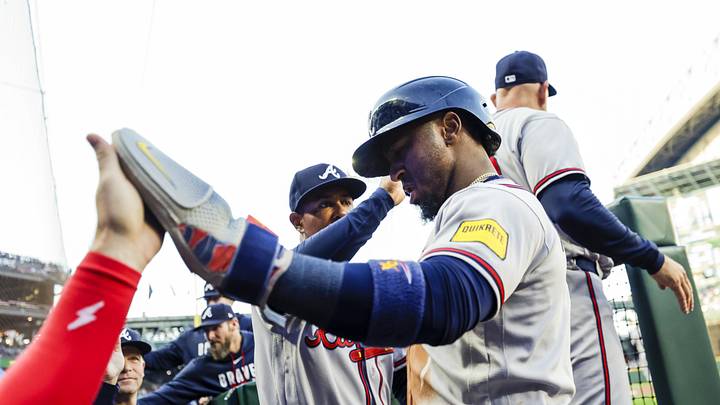 May 5, 2026; Seattle, Washington, USA; Atlanta Braves first baseman Matt Olson (28) high-fives teammates in the dugout after scoring a run against the Seattle Mariners during the fourth inning at T-Mobile Park. Mandatory Credit: Joe Nicholson-Imagn Images
