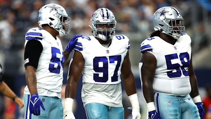 Aug 12, 2023; Arlington, Texas, USA;Dallas Cowboys defensive tackle Osa Odighizuwa (97) and defensive tackle Mazi Smith (58) on the field in the game against the Jacksonville Jaguars  at AT&T Stadium.