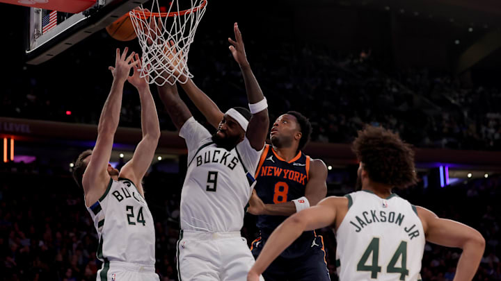 Nov 8, 2024; New York, New York, USA; New York Knicks forward OG Anunoby (8) fights for a rebound against Milwaukee Bucks guard Pat Connaughton (24) and forward Bobby Portis (9) and guard Andre Jackson Jr. (44) during the fourth quarter at Madison Square Garden. Mandatory Credit: Brad Penner-Imagn Images Nov 8, 2024; New York, New York, USA; New York Knicks forward OG Anunoby (8) fights for a rebound against Milwaukee Bucks guard Pat Connaughton (24) and forward Bobby Portis (9) and guard Andre Jackson Jr. (44) during the fourth quarter at Madison Square Garden. Mandatory Credit: Brad Penner-Imagn Images