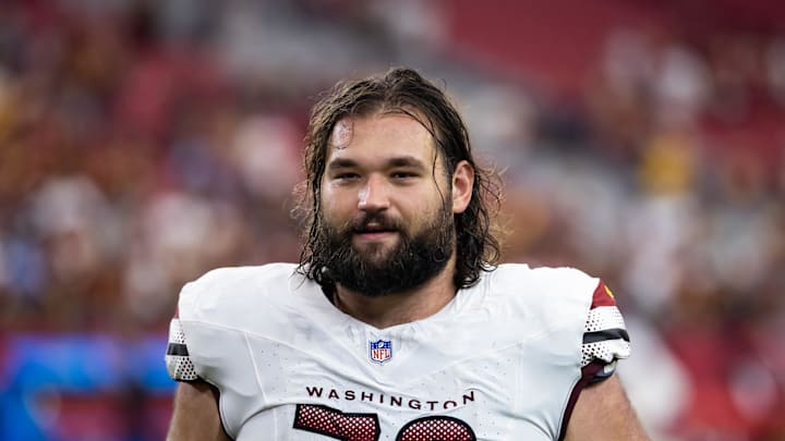 Sep 29, 2024; Glendale, Arizona, USA; Washington Commanders guard Sam Cosmi (76) against the Arizona Cardinals at State Farm Stadium. Mandatory Credit: Mark J. Rebilas-Imagn Images Sep 29, 2024; Glendale, Arizona, USA; Washington Commanders guard Sam Cosmi (76) against the Arizona Cardinals at State Farm Stadium. Mandatory Credit: Mark J. Rebilas-Imagn Images