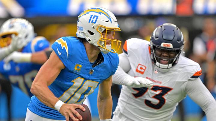 Sep 21, 2025; Inglewood, California, USA; Los Angeles Chargers quarterback Justin Herbert (10) is pressured by Denver Broncos defensive tackle DJ. Jones (93) in the second half at SoFi Stadium. Mandatory Credit: Jayne Kamin-Oncea-Imagn Images Sep 21, 2025; Inglewood, California, USA; Los Angeles Chargers quarterback Justin Herbert (10) is pressured by Denver Broncos defensive tackle DJ. Jones (93) in the second half at SoFi Stadium. Mandatory Credit: Jayne Kamin-Oncea-Imagn Images