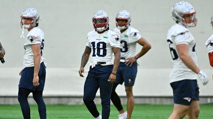 May 9, 2025; Foxborough, MA, USA; New England Patriots wide receiver Kyle Williams (18) warms up before practice at rookie camp at Gillette Stadium. Mandatory Credit: Eric Canha-Imagn Images