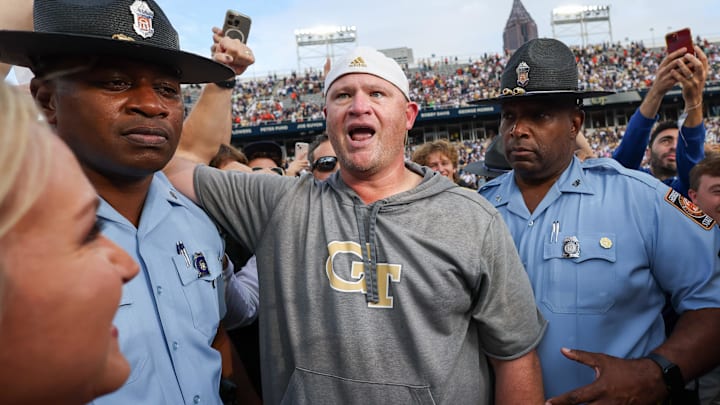 Nov 9, 2024; Atlanta, Georgia, USA; Georgia Tech Yellow Jackets head coach Brent Key celebrates after a victory over the Miami Hurricanes at Bobby Dodd Stadium at Hyundai Field. Mandatory Credit: Brett Davis-Imagn Images