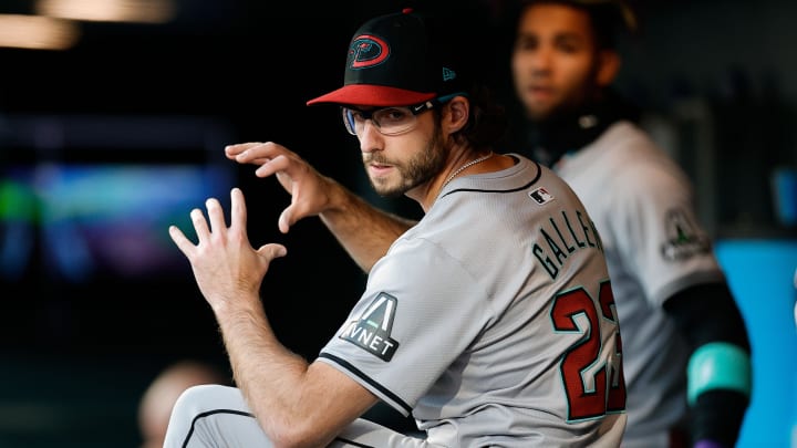 Apr 8, 2024; Denver, Colorado, USA; Arizona Diamondbacks starting pitcher Zac Gallen (23) in the dugout in the first inning against the Colorado Rockies at Coors Field. Mandatory Credit: Isaiah J. Downing-USA TODAY Sports