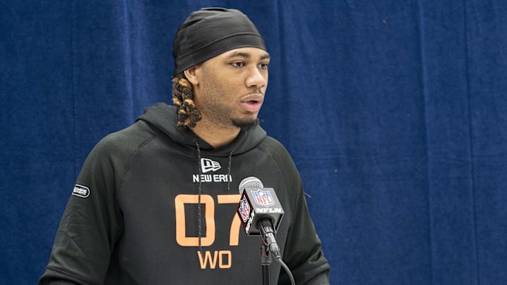 Miami's Sam Brown (WO07) answers questions at a press conference during the 2025 NFL Combine at Indiana Convention Center. 