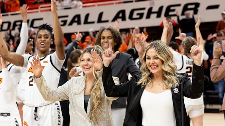 Jan 17, 2024; Stillwater, Okla, USA; Oklahoma State Cowgirls head coach Jacie Hoyt celebrates with the team after a women  s NCAA basketball game against the BYU Cougars at Gallagher Iba Arena. Mandatory Credit: Mitch Alcala-The Oklahoman