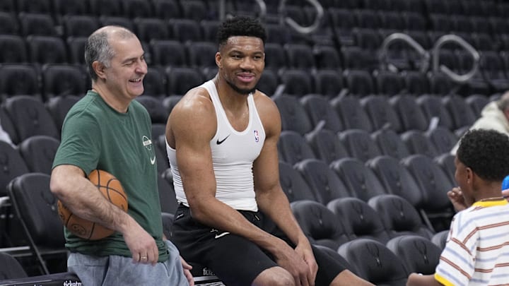 Mar 29, 2026; Milwaukee, Wisconsin, USA; Milwaukee Bucks forward Giannis Antetokounmpo (34) and his personal trainer Michael Kalavros take a break from pregame warmups to talk to a fan before a game against the LA Clippers at Fiserv Forum. Mandatory Credit: Michael McLoone-Imagn Images Mar 29, 2026; Milwaukee, Wisconsin, USA; Milwaukee Bucks forward Giannis Antetokounmpo (34) and his personal trainer Michael Kalavros take a break from pregame warmups to talk to a fan before a game against the LA Clippers at Fiserv Forum. Mandatory Credit: Michael McLoone-Imagn Images