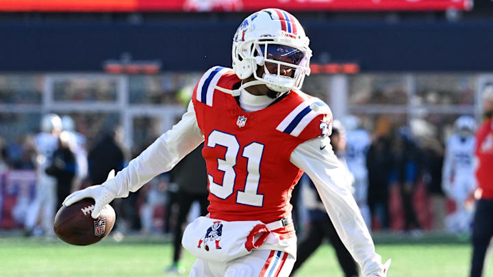 Dec 1, 2024; Foxborough, Massachusetts, USA; New England Patriots cornerback Jonathan Jones (31) warms up before a game against the Indianapolis Colts at Gillette Stadium. Dec 1, 2024; Foxborough, Massachusetts, USA; New England Patriots cornerback Jonathan Jones (31) warms up before a game against the Indianapolis Colts at Gillette Stadium.