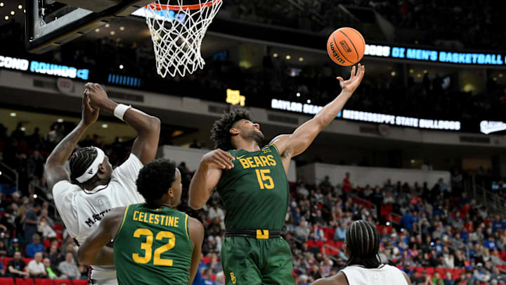 Mar 21, 2025; Raleigh, NC, USA; Baylor Bears forward Norchad Omier (15) reaches for the ball against the Mississippi State Bulldogs during the second half in the first round of the NCAA Tournament at Lenovo Center. Mandatory Credit: Zachary Taft-Imagn Images