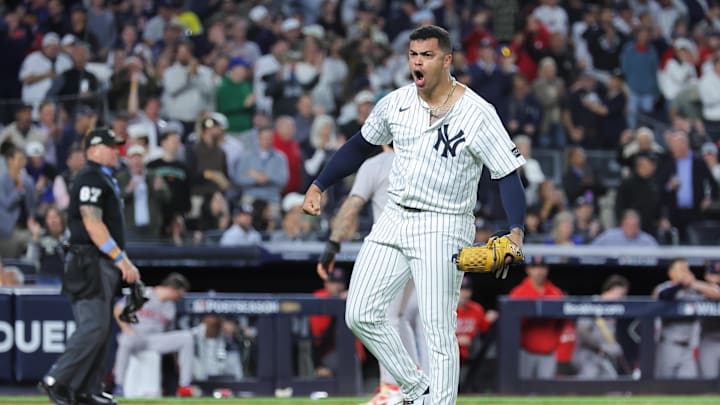 Oct 1, 2025; Bronx, New York, USA; New York Yankees relief pitcher Fernando Cruz (63) celebrates a bases loaded fly out to end the seventh inning against the Boston Red Sox during game two of the Wildcard round for the 2025 MLB playoffs at Yankee Stadium. Mandatory Credit: Brad Penner-Imagn Images Oct 1, 2025; Bronx, New York, USA; New York Yankees relief pitcher Fernando Cruz (63) celebrates a bases loaded fly out to end the seventh inning against the Boston Red Sox during game two of the Wildcard round for the 2025 MLB playoffs at Yankee Stadium. Mandatory Credit: Brad Penner-Imagn Images