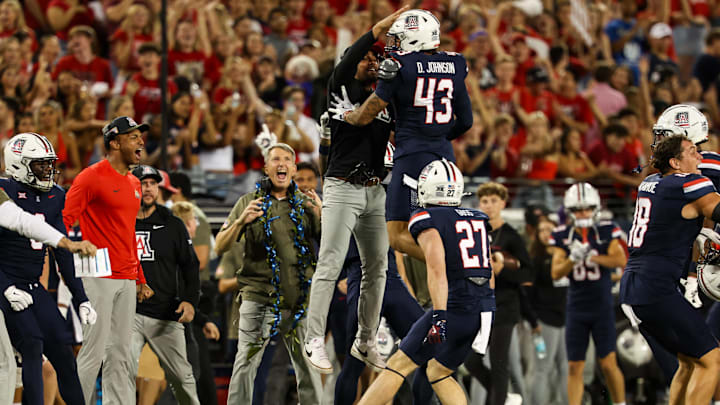 Oct 5, 2024; Tucson, Arizona, USA; Arizona Wildcats defensive back Dalton Johnson (43) celebrates turnover with team during third quarter against Texas Tech Red Raiders at Arizona Stadium. Oct 5, 2024; Tucson, Arizona, USA; Arizona Wildcats defensive back Dalton Johnson (43) celebrates turnover with team during third quarter against Texas Tech Red Raiders at Arizona Stadium.