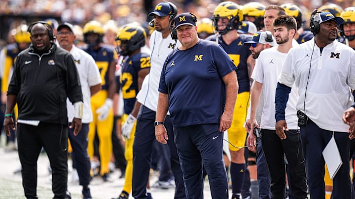 Michigan acting head coach Biff Poggi watches a play against Central Michigan 