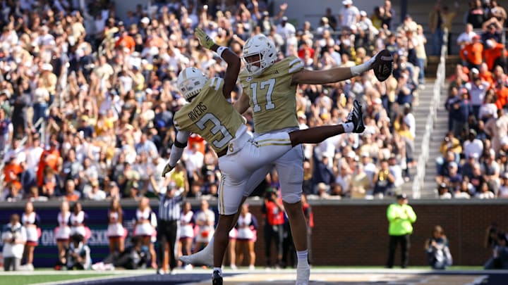 Oct 25, 2025; Atlanta, Georgia, USA; Georgia Tech Yellow Jackets tight end Josh Beetham (17) celebrates with wide receiver Eric Rivers (3) after a touchdown against the Syracuse Orange in the second quarter at Bobby Dodd Stadium at Hyundai Field. Mandatory Credit: Brett Davis-Imagn Images Oct 25, 2025; Atlanta, Georgia, USA; Georgia Tech Yellow Jackets tight end Josh Beetham (17) celebrates with wide receiver Eric Rivers (3) after a touchdown against the Syracuse Orange in the second quarter at Bobby Dodd Stadium at Hyundai Field. Mandatory Credit: Brett Davis-Imagn Images
