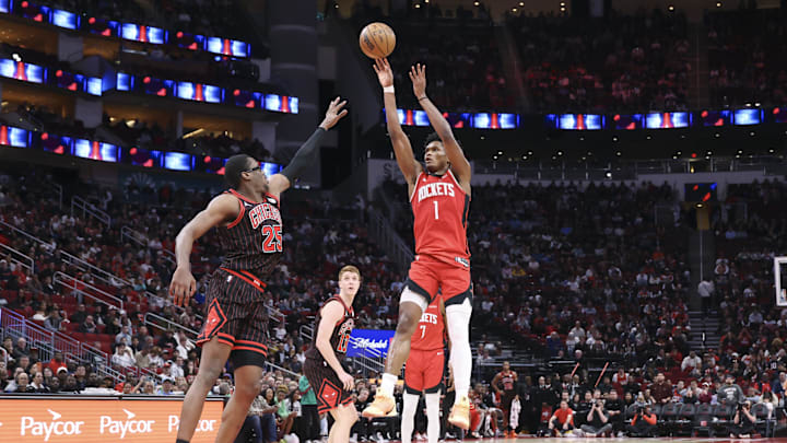 Jan 13, 2026; Houston, Texas, USA; Houston Rockets guard Amen Thompson (1) shoots the ball as Chicago Bulls forward Jalen Smith (25) defends during the second half at Toyota Center. Mandatory Credit: Troy Taormina-Imagn Images