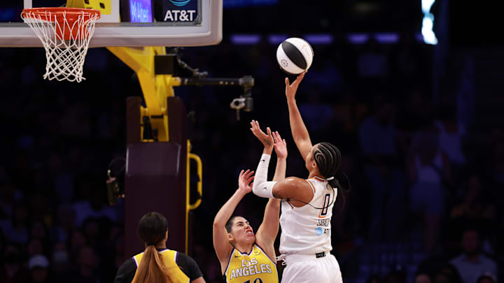 Jun 1, 2025; Los Angeles, California, USA;  Phoenix Mercury guard Sevgi Uzun (10) shoots the ball over Los Angeles Sparks guard Kelsey Plum (10) during the second half at Crypto.com Arena. Mandatory Credit: Kiyoshi Mio-Imagn Images