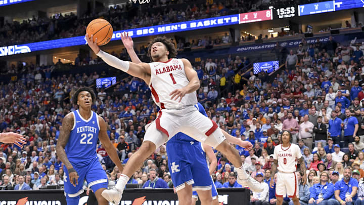 Mar 14, 2025; Nashville, TN, USA;  Alabama Crimson Tide guard Mark Sears (1) lays the ball in against the Kentucky Wildcats during the first half at Bridgestone Arena. Mandatory Credit: Steve Roberts-Imagn Images
