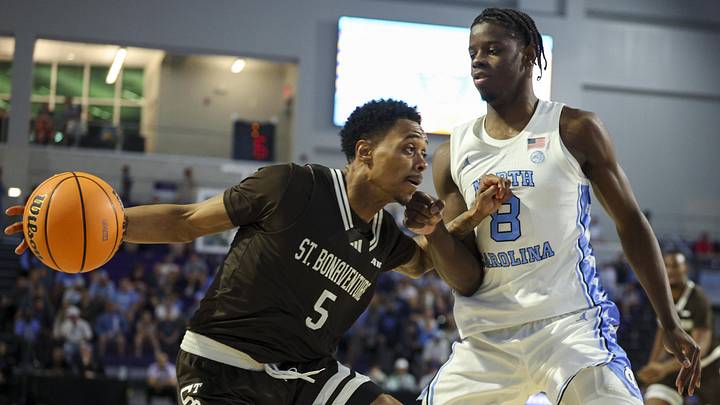 St. Bonaventure Bonnies guard Dasonte Bowen moves the ball past North Carolina Tar Heels forward Caleb Wilson in the second half at Suncoast Credit Union Arena. St. Bonaventure Bonnies guard Dasonte Bowen moves the ball past North Carolina Tar Heels forward Caleb Wilson in the second half at Suncoast Credit Union Arena.