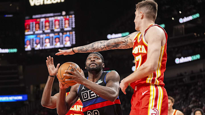 Jan 22, 2025; Atlanta, Georgia, USA; Detroit Pistons center Isaiah Stewart (28) is defended by Atlanta Hawks guard Vit Krejci (27) during the first half at State Farm Arena. Mandatory Credit: Dale Zanine-Imagn Images