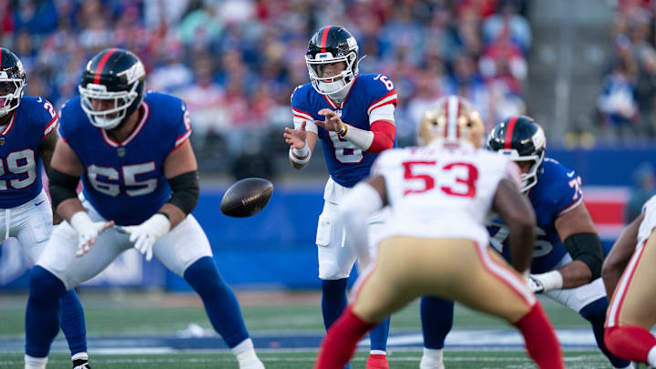 New York Giants quarterback Jaxson Dart (6) receives a snap from New York Giants center Austin Schlottmann (65) during a week 9 game between New York Giants and San Francisco 49ers at MetLife Stadium on Sunday, Nov. 2, 2025.