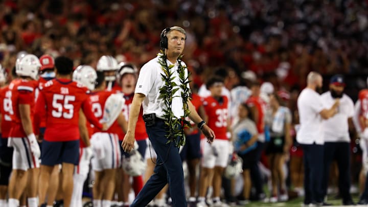 Sep 7, 2024; Tucson, Arizona, USA; Arizona Wildcats head coach Brent Brennan looks at score board against the Northern Arizona Lumberjacks during first quarter at Arizona Stadium. Mandatory Credit: Aryanna Frank-Imagn Images