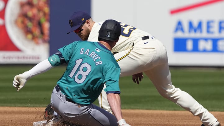 Mar 9, 2024; Phoenix, Arizona, USA; Seattle Mariners Mitch Garver (18) steals second base in front Mar 9, 2024; Phoenix, Arizona, USA; Seattle Mariners Mitch Garver (18) steals second base in front