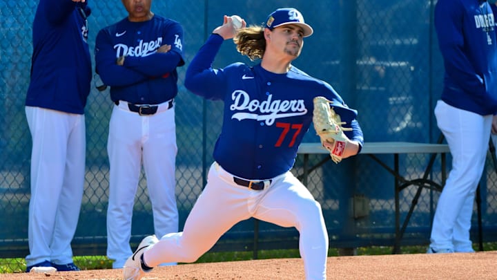 Feb 17, 2026; Glendale, AZ, USA; Los Angeles Dodgers pitcher Ryan River (77) throws during a Spring Training workout at Camelback Ranch. Mandatory Credit: Matt Kartozian-Imagn Images Feb 17, 2026; Glendale, AZ, USA; Los Angeles Dodgers pitcher Ryan River (77) throws during a Spring Training workout at Camelback Ranch. Mandatory Credit: Matt Kartozian-Imagn Images