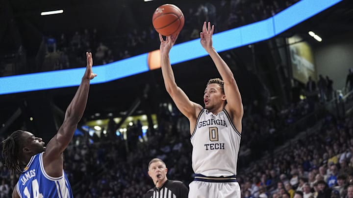 Dec 21, 2024; Atlanta, Georgia, USA; Georgia Tech Yellow Jackets guard Lance Terry (0) shoots over Duke Blue Devils guard Sion James (14) at McCamish Pavilion. Mandatory Credit: Dale Zanine-Imagn Images