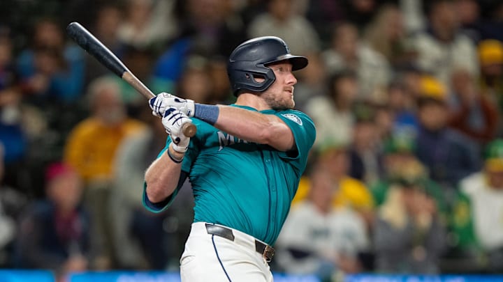 Seattle Mariners first baseman Luke Raley (20) hits a two-run home run during the ninth inning against the Oakland Athletics at T-Mobile Park in 2024. Seattle Mariners first baseman Luke Raley (20) hits a two-run home run during the ninth inning against the Oakland Athletics at T-Mobile Park in 2024.