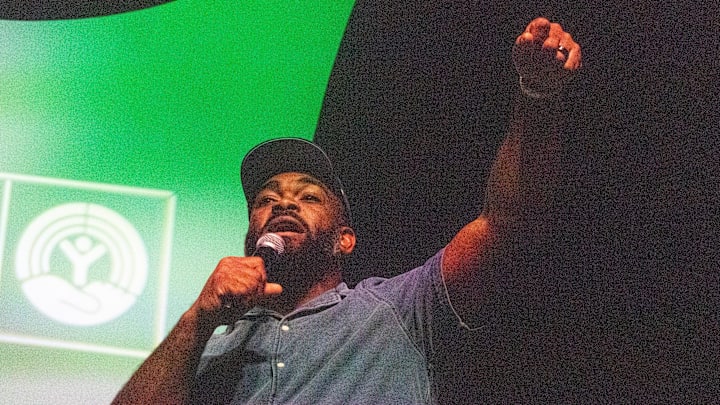 Former Philadelphia Eagles’ player and two-time Super Bowl champion Brandon Graham leads an Eagles chant with the group of attendees at the Lebanon Expo Center in Lebanon County, Pennsylvania on Wednesday, Sept. 10, 2025.