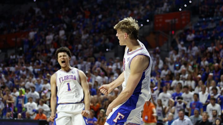 Mar 1, 2025; Gainesville, Florida, USA; Florida Gators forward Thomas Haugh (10) and guard Walter Clayton Jr. (1) react after a dunk against the Texas A&M Aggies during the second half at Exactech Arena at the Stephen C. O'Connell Center. Mandatory Credit: Morgan Tencza-Imagn Images
