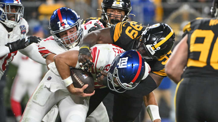 Oct 28, 2024; Pittsburgh, Pennsylvania, USA; Pittsburgh Steelers defensive tackle Larry Ogunjobi (99) New York Giants quarterback Daniel Jones (8) during the second quarter at Acrisure Stadium. Oct 28, 2024; Pittsburgh, Pennsylvania, USA; Pittsburgh Steelers defensive tackle Larry Ogunjobi (99) New York Giants quarterback Daniel Jones (8) during the second quarter at Acrisure Stadium.