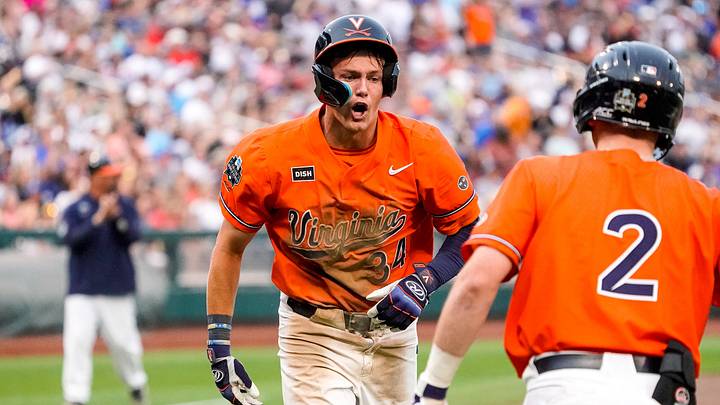 Jun 16, 2023; Omaha, NE, USA; Virginia Cavaliers left fielder Harrison Didawick (34) celebrates with center fielder Ethan O'Donnell (2) after scoring against the Florida Gators during the seventh inning at Charles Schwab Field Omaha. Mandatory Credit: Dylan Widger-Imagn Images Jun 16, 2023; Omaha, NE, USA; Virginia Cavaliers left fielder Harrison Didawick (34) celebrates with center fielder Ethan O'Donnell (2) after scoring against the Florida Gators during the seventh inning at Charles Schwab Field Omaha. Mandatory Credit: Dylan Widger-Imagn Images