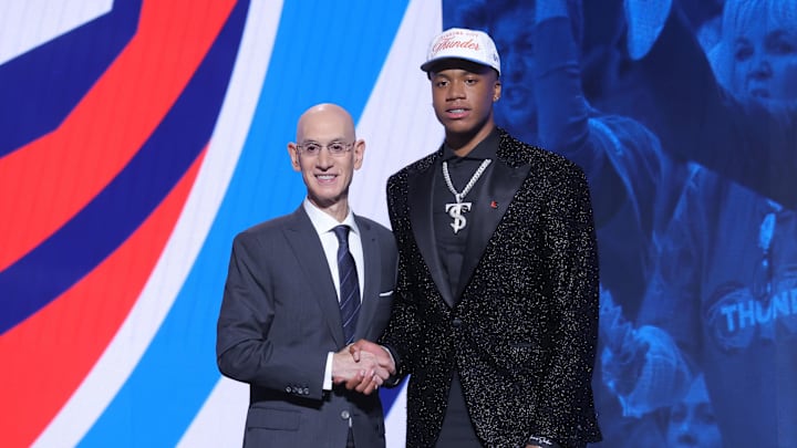 Jun 25, 2025; Brooklyn, NY, USA; Thomas Sorber stands with NBA commissioner Adam Silver after being selected as the 15th pick by the Oklahoma City Thunder in the first round of the 2025 NBA Draft at Barclays Center. Jun 25, 2025; Brooklyn, NY, USA; Thomas Sorber stands with NBA commissioner Adam Silver after being selected as the 15th pick by the Oklahoma City Thunder in the first round of the 2025 NBA Draft at Barclays Center.