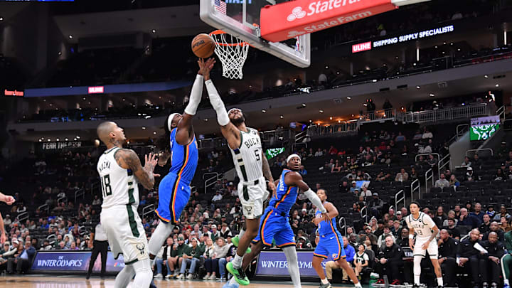 Oct 14, 2025; Milwaukee, Wisconsin, USA; Milwaukee Bucks guard Gary Trent Jr. (5) goes up for a shot against the Oklahoma City Thunder during the first half at Fiserv Forum. Mandatory Credit: Patrick Gorski-Imagn Images
