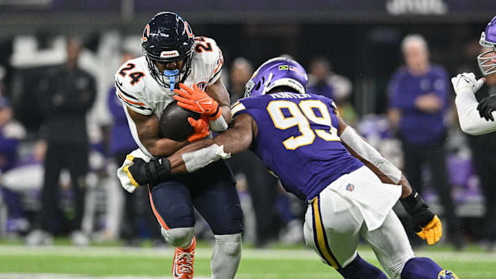Nov 27, 2023; Minneapolis, Minnesota, USA; Chicago Bears running back Khalil Herbert (24) runs the