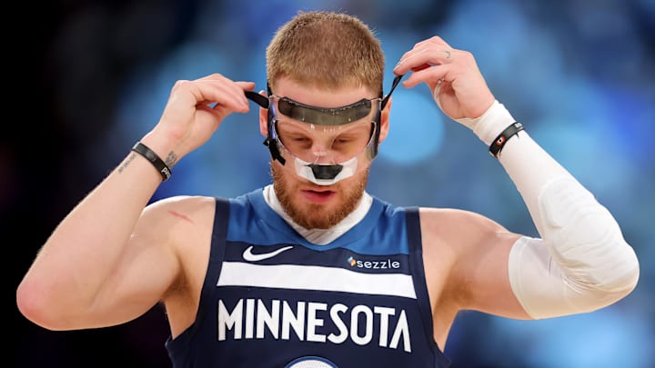 Nov 5, 2025; New York, New York, USA; Minnesota Timberwolves guard Donte DiVincenzo (0) adjusts his facemask during the second quarter against the New York Knicks at Madison Square Garden. Mandatory Credit: Brad Penner-Imagn Images Nov 5, 2025; New York, New York, USA; Minnesota Timberwolves guard Donte DiVincenzo (0) adjusts his facemask during the second quarter against the New York Knicks at Madison Square Garden. Mandatory Credit: Brad Penner-Imagn Images