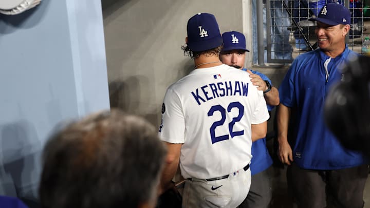 Sep 19, 2025; Los Angeles, California, USA;  Los Angeles Dodgers pitcher Clayton Kershaw (22) walks to the clubhouse after being relieved during the fifth inning against the San Francisco Giants at Dodger Stadium. Mandatory Credit: Kiyoshi Mio-Imagn Images