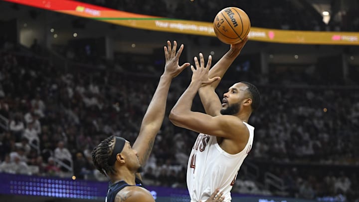 Apr 20, 2024; Cleveland, Ohio, USA; Cleveland Cavaliers forward Evan Mobley (4) shoots beside
