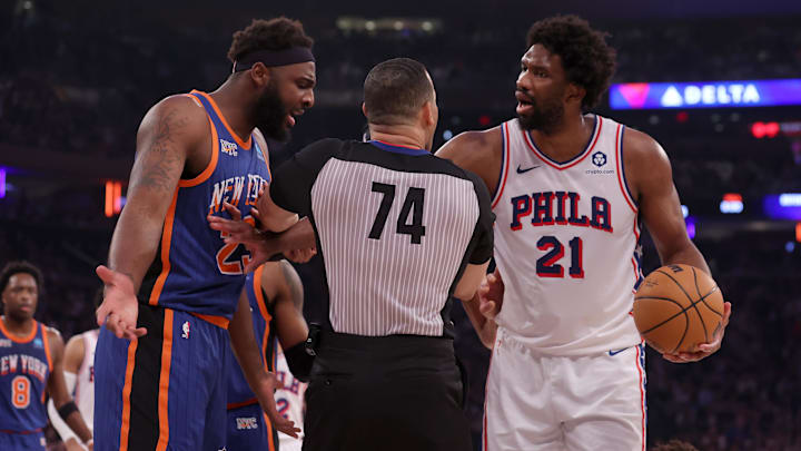 Apr 30, 2024; New York, New York, USA; New York Knicks center Mitchell Robinson (23) has words with